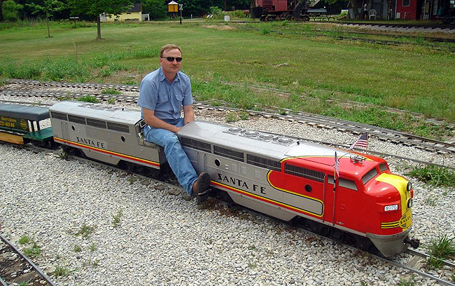 Who’s your “chief” ? This guy is. One of the Hesston Steam Museum volunteers operates a matched Santa Fe A-B pair of F7’s on the museum’s 1/8 scale railroad, hauling kids and kids-at-heart on a mile long loop of track. 