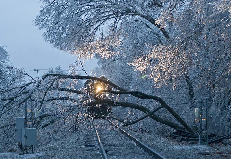 A P&L freight waits for a MOW crew from West Yards in Madisonville, Ky to arrive and clear away a tree that fell due to the Ice Storm that struck Kentucky on January 27, 2008. (Photo by Jim Pearson)