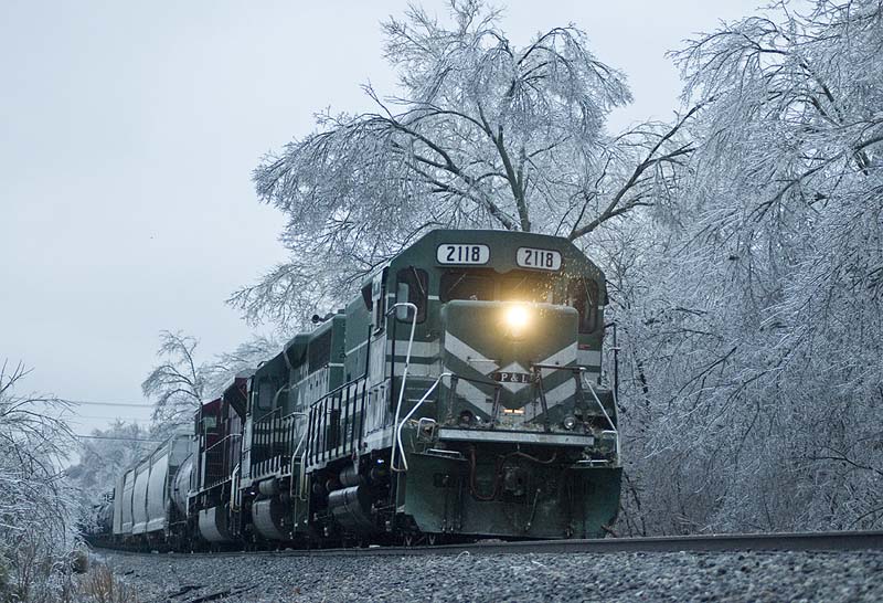 Here's a view of the train behind the downed tree. All the trees through out the area were covered with ice due to the storm. (Photo by Jim Pearson)