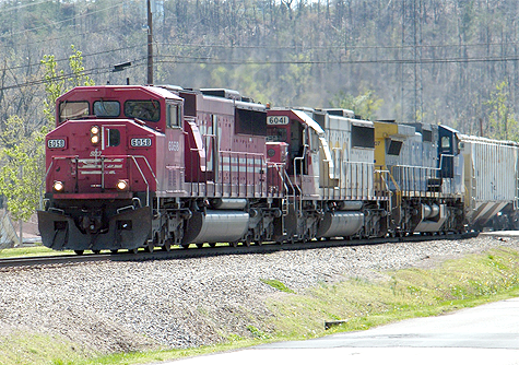 Another photo taken from Ricky Bivin’s working driveway in Mortons Gap. Two ex Soo Line locomotives headed northbound. Believe they took the main through town.  Photo by Matt Gentry.