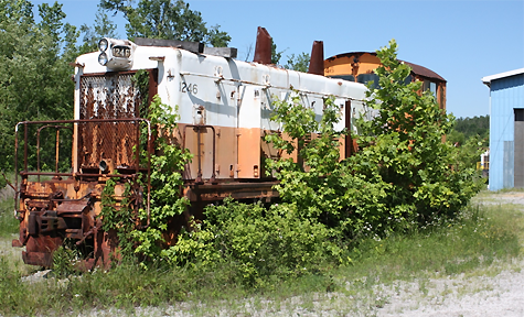 The remnants of old IC switcher at St. Charles, KY, long since cannibalized for parts, sits in a basket of undergrowth - ashes to ashes, rust to dust?  It’s the sick minister side of me coming out.   (Photo by Bill Thomas)