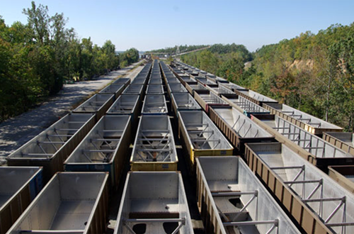 This shot was taken on October 12, at Grand Rivers, KY.  The long-vacant BRT3 trackage is now being used to store excess coal hoppers.  The coal business is off a bit both due to economics and to the mild summer weather.   Photo by Chuck Hinrichs.