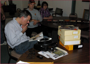 Dr. Fred Ripley prepares slides for his April program on Western lines of the Pennsylvania Railroad.  