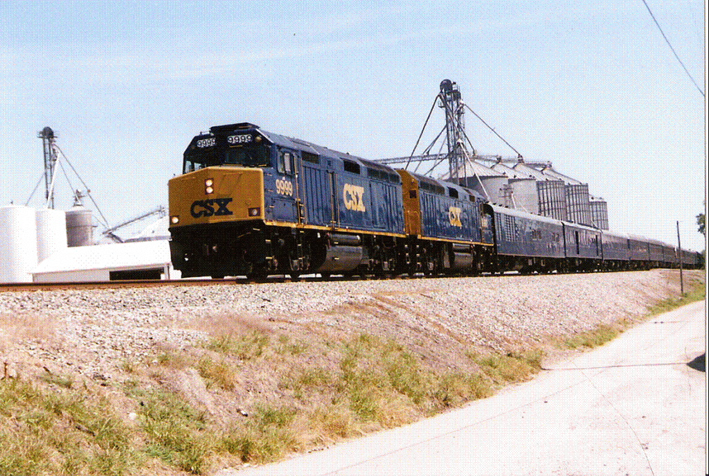 CSX’s business train made a quick appearance on the Henderson Sub on its trip from Nashville to Evansville August 23, 2011.  Wallace Henderson caught it at Pembroke, KY, that day.  Nicely framed by the grain elevators.