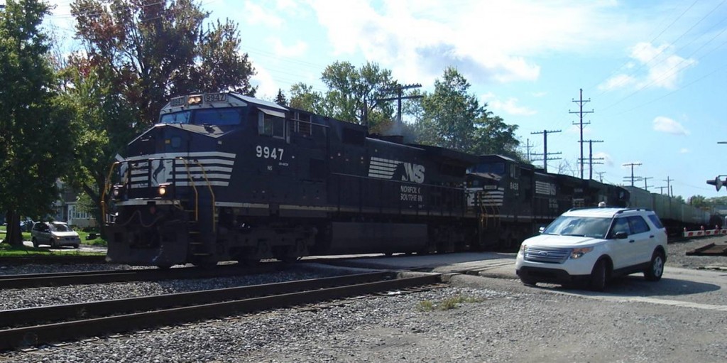 In the old Conrail days, the Conrail line through Astabula, Ohio carried several hot intermodal trains known as the TV-series mail trains. True-blue Conrail fans would say that Norfolk Southern has "black-mailed" this operation, as evidenced by this eastbound intermodal flying through Astabula on October 4, 2011.  Submitted by Chris Dees.