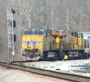 A southbound grain train led by UP power exits the Madisonville bypass at Mortons Gap KY on March 7, 2014. -Rick Bivins