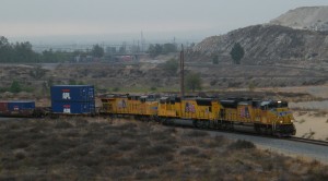 UP SD70ACe leads a stack train west towards Los Angeles CA with a shockingly clean SD70M #3904 and ES44AC #7726 in tow.