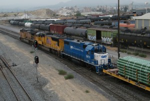 GMTX #2110 helps lead a train east out of UP’s Colton Yard.