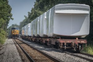 August 5, 2016 – Southbound CSX loaded coal train N320 (Evansville, IN (EVWR) - Cross, SC) meets W987-30 with a load of windmill motors waiting to go north from the north end of Hanson siding as N320 makes it's way south on the Henderson Subdivision at Hanson, Ky. - Tech Info: 1/640 | f/13 | ISO 720 | Lens: Sigma 150-600 @ 290mm with a Nikon D800 shot and processed in RAW.